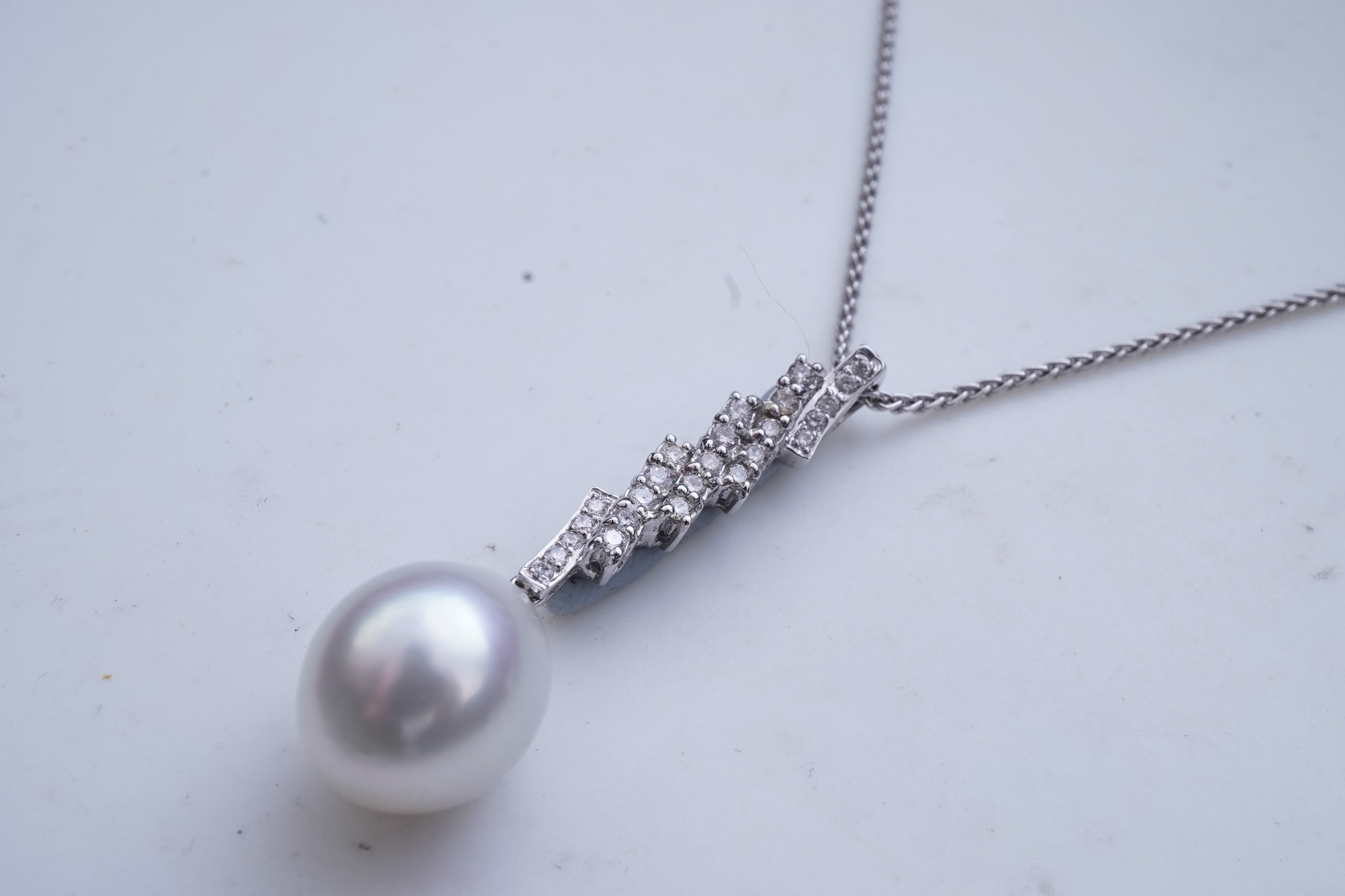 A diamond pendant necklace